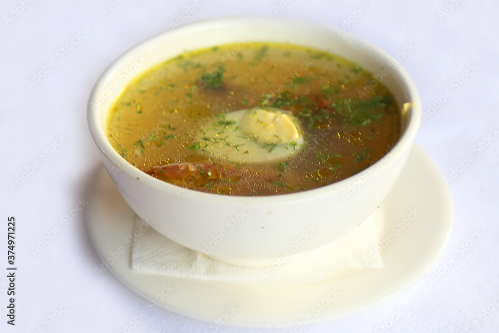 Chicken Egg in Meat Broth, dishes of Russian national cuisine Chicken Egg in Meat Broth, dishes of Russian national cuisine