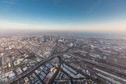 Aerial view of West Melbourne at sunset with the Melbourne CBD and Docklands in view, Austrialia. photo