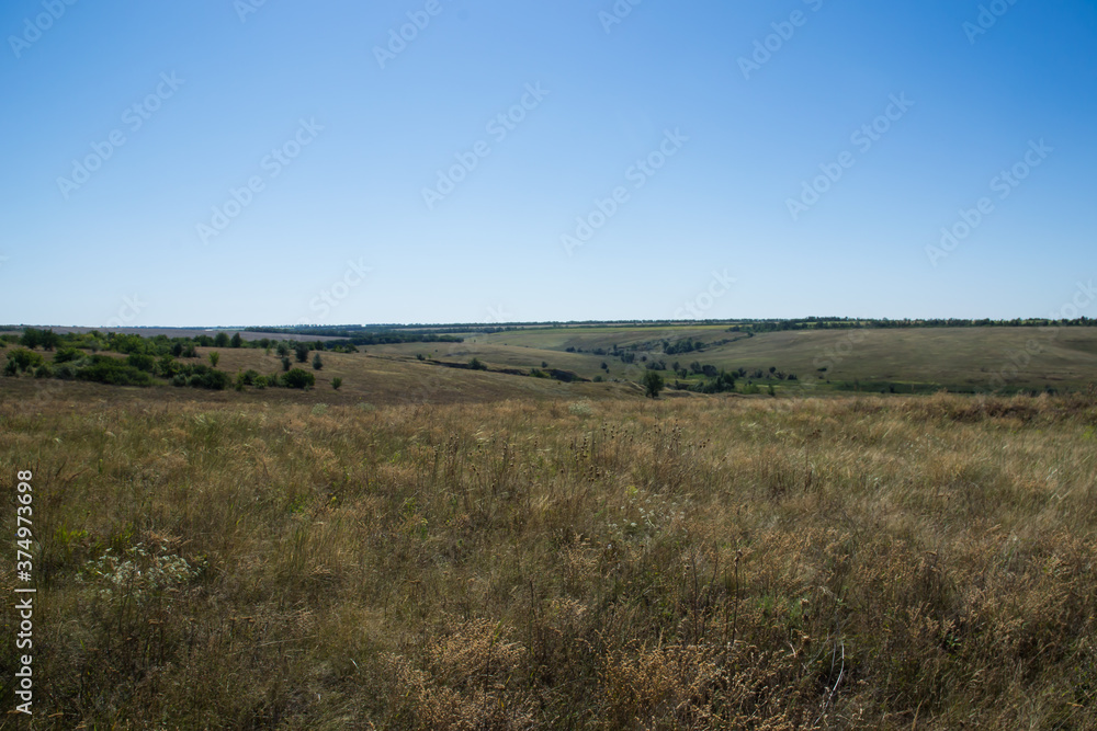 panoramic view of the vastness, hills and meadows of Ukraine in August panoramic view of the vastness, hills and meadows of Ukraine in August