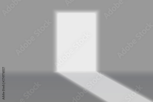 Door light shadow on grey wall
