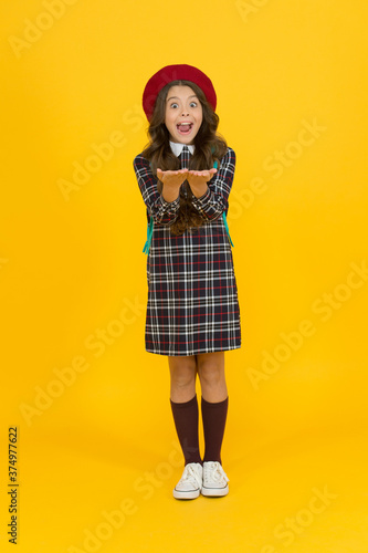 wow. surprised child ready for schoolyear. education. knowledge day. happy childhood. french style concept. back to school. retro girl wear uniform and parisian beret. kid school fashion