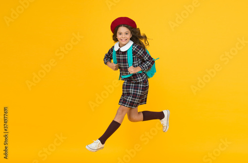 small girl running to school, study