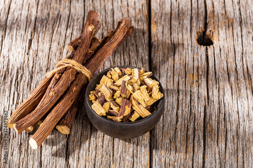 licorice root, on the wooden table