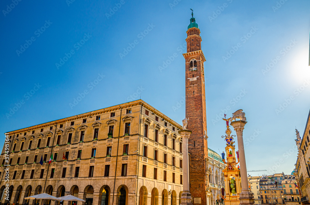 Comune di Vicenza Ufficio Patrimonio, Torre Bissara clock tower and column with winged lion and statues in Piazza dei Signori square, old historical city centre of Vicenza city, Veneto region, Italy
