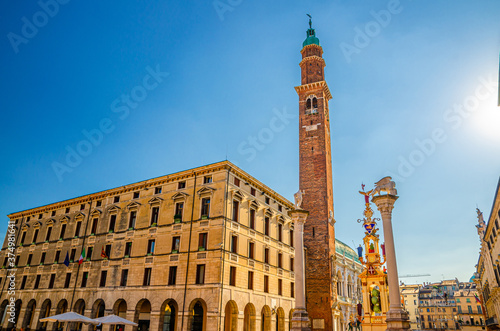 Comune di Vicenza Ufficio Patrimonio, Torre Bissara clock tower and column with winged lion and statues in Piazza dei Signori square, old historical city centre of Vicenza city, Veneto region, Italy