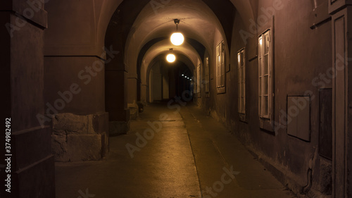 Night photo of an old and dark alley