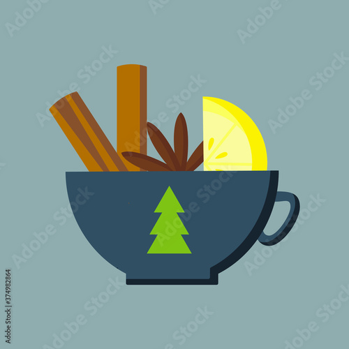 Wide cozy cup with mulled wine, hot drink with cinnamon, anise and citrus fruit, decorative cup with a picture of a green Christmas tree