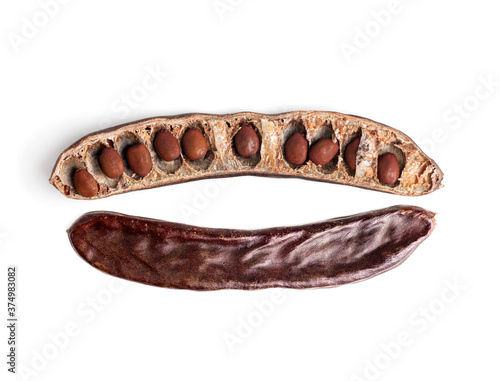 Принти на полотні carob isolated on white background, pod open with grains and whole