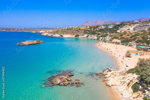 Fototapeta Naklejka Na Ścianę i Meble -  Sandy beach of Kalathas with the picturesque islet in Akrotiri Chania, Crete, Greece.