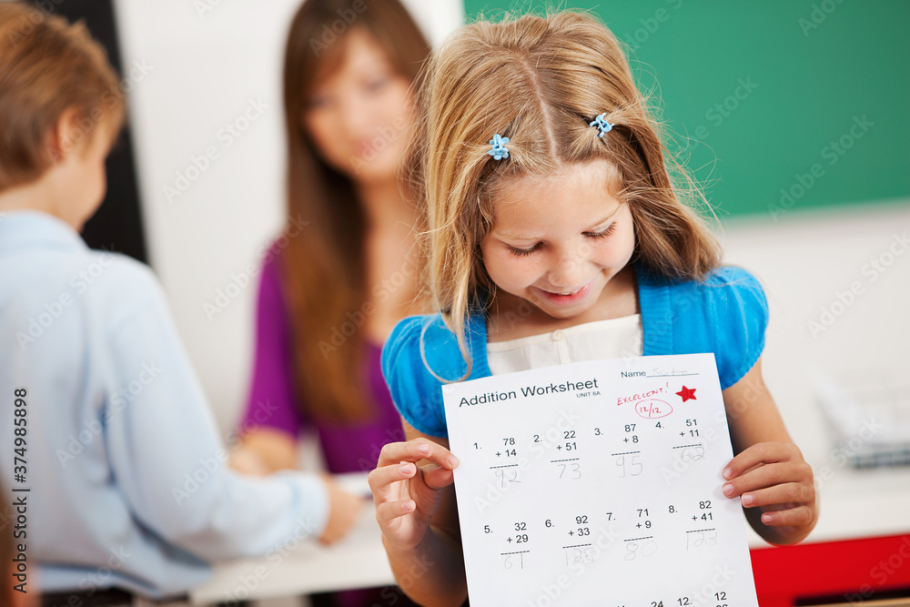 Classroom: Girl Proud of Great Grade on Paper Classroom: Girl Proud of Great Grade on Paper