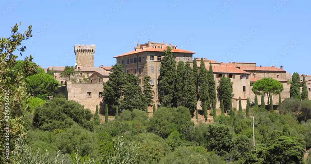 Ancient village in tuscany, Italy. Panorama of Populonia, medieval village on hill with ancient architecture. Summertime. Ancient village in tuscany, Italy. Panorama of Populonia, medieval village on hill with ancient architecture. Summertime.