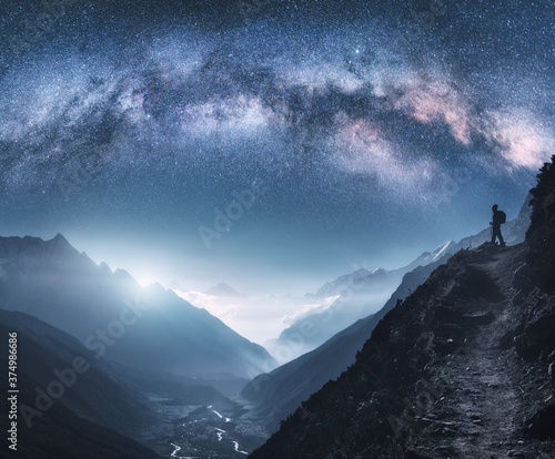 Arched Milky Way, woman and...