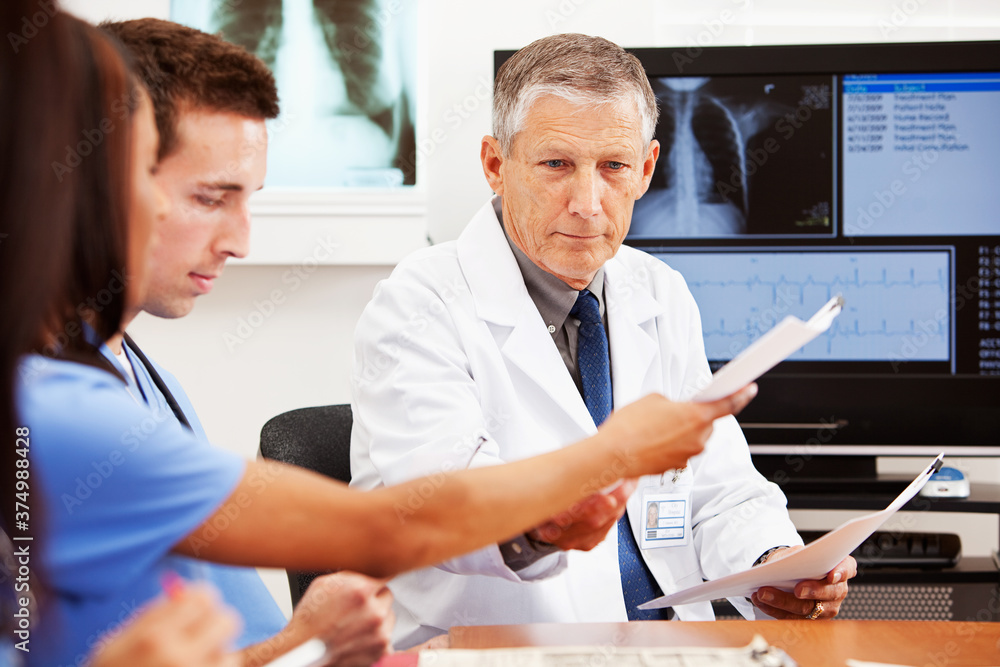 Doctors: Passing Around Paperwork Doctors: Passing Around Paperwork