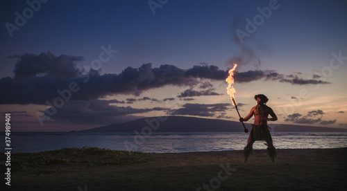 Traditional Hawaiian Fire Dancer photo