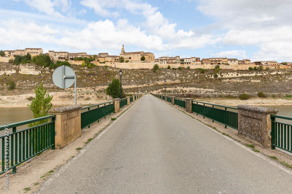 the bridge over Riaza river (Linares reservoir) going to Maderuelo medieval village, province of Segovia, Castile and Leon, Spain