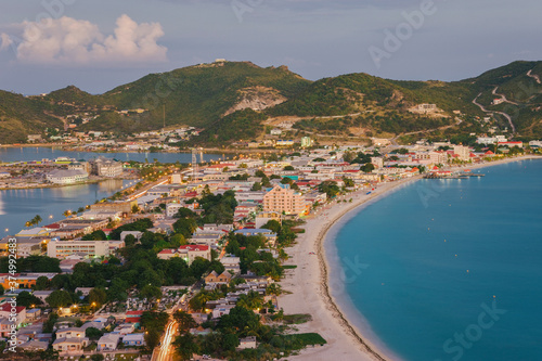 West Indies, Caribbean, Lesser Antilles, Leeward Islands, St Martin / Sint Maarten, Netherlands Antilles, elevated view over Great Bay and the Dutch capital of Philipsburg photo