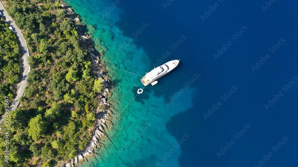 Aerial drone photo of beautiful paradise peninsula and bay of Skinos with many crystal clear beaches in beautiful Ionian island of Ithaki or Ithaca, Greece Aerial drone photo of beautiful paradise peninsula and bay of Skinos with many crystal clear beaches in beautiful Ionian island of Ithaki or Ithaca, Greece