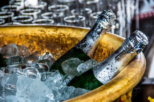 champagne bottle in the middle of the ice