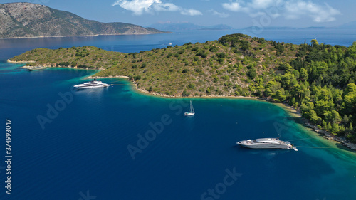 Aerial drone photo of beautiful paradise peninsula and bay of Skinos with many crystal clear beaches in beautiful Ionian island of Ithaki or Ithaca, Greece © aerial-drone