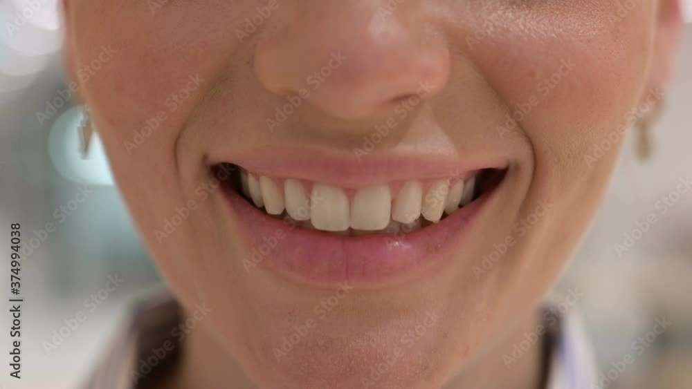 Close up of Mouth of Woman Smiling at the Camera Close up of Mouth of Woman Smiling at the Camera