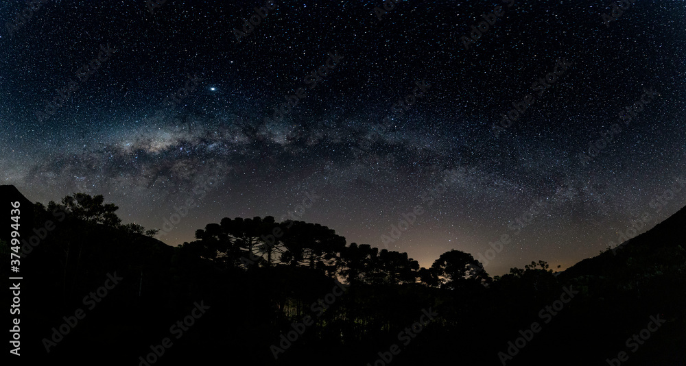 Panorama of a starry night sky with milkyway in Minas Gerais, Brazil.