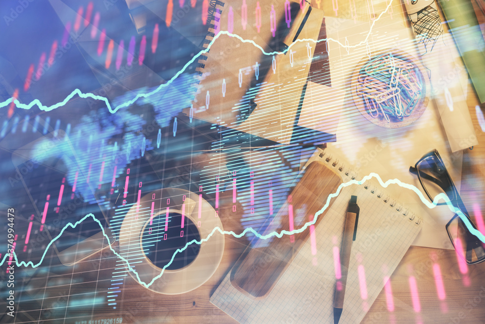 Double exposure of forex graph drawing and work table top veiw. Concept of financial analysis. Double exposure of forex graph drawing and work table top veiw. Concept of financial analysis.