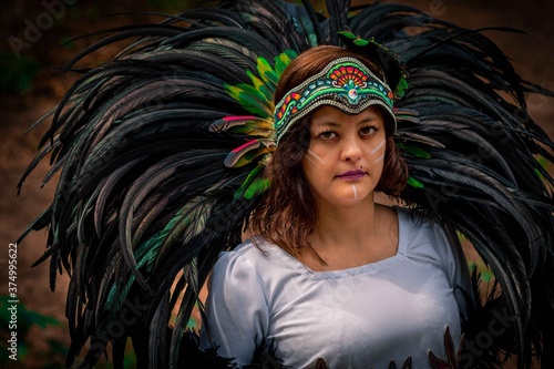 BEAUTIFUL MEXICAN WOMAN WEARING CEREMONIAL COSTUME MEXICA