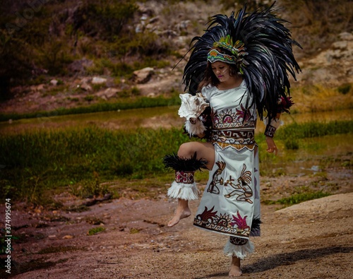 BEAUTIFUL MEXICAN WOMAN WEARING CEREMONIAL COSTUME MEXICA