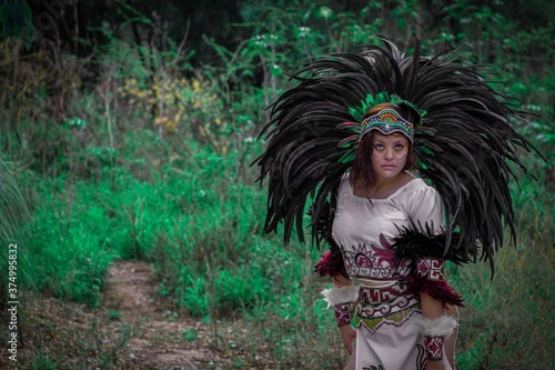 BEAUTIFUL MEXICAN WOMAN WEARING CEREMONIAL COSTUME MEXICA