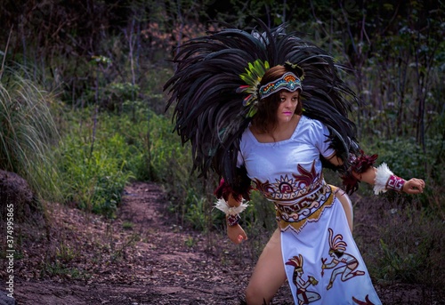 BEAUTIFUL MEXICAN WOMAN WEARING CEREMONIAL COSTUME MEXICA