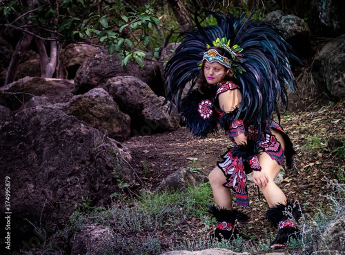 BEAUTIFUL MEXICAN WOMAN WEARING CEREMONIAL COSTUME MEXICA