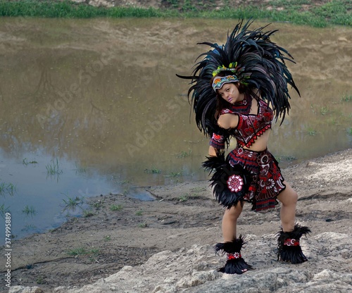 BEAUTIFUL MEXICAN WOMAN WEARING CEREMONIAL COSTUME MEXICA