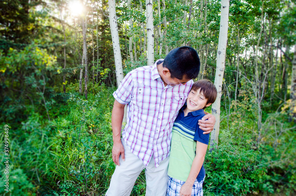 father and son in trees