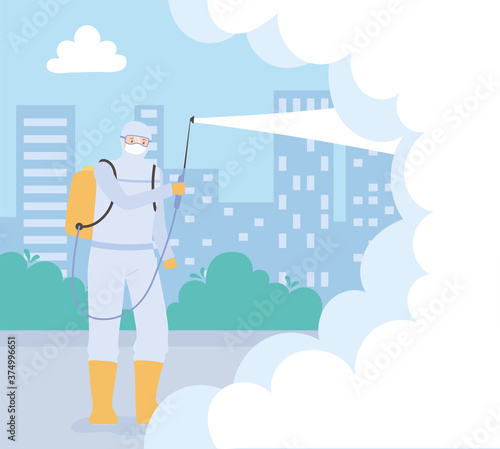 virus disinfection, worker in a protective suit sprays cleaning products disinfects a chemical, coronavirus preventive measure