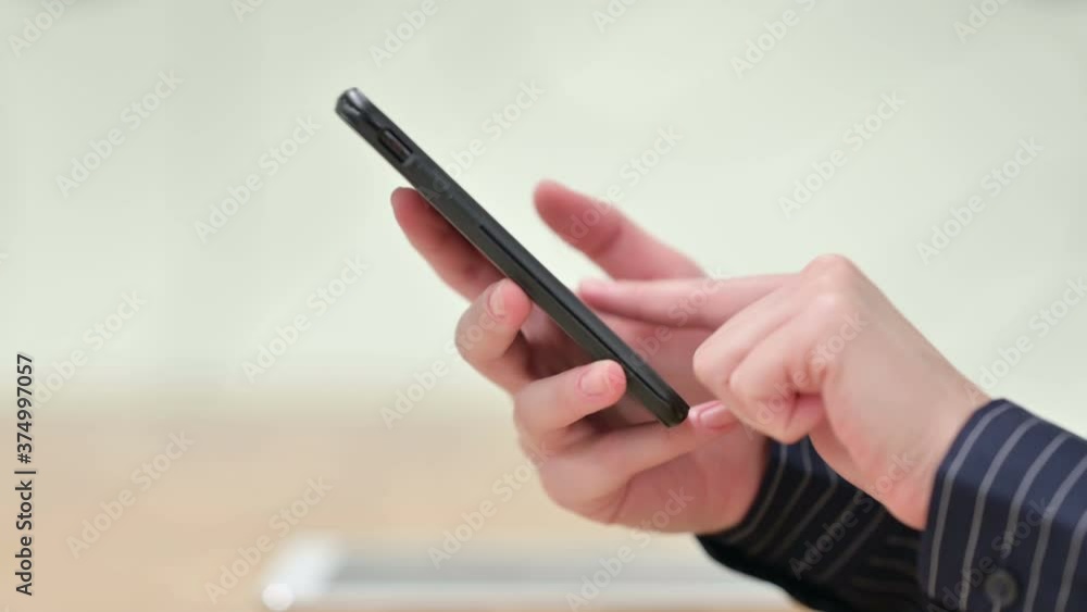 Close Up of Female Hand using Smartphone Close Up of Female Hand using Smartphone