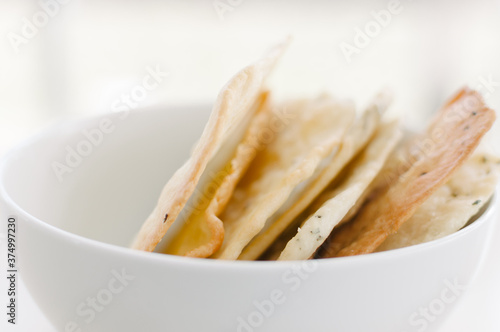 A bowl of homemade flatbread crackers photo