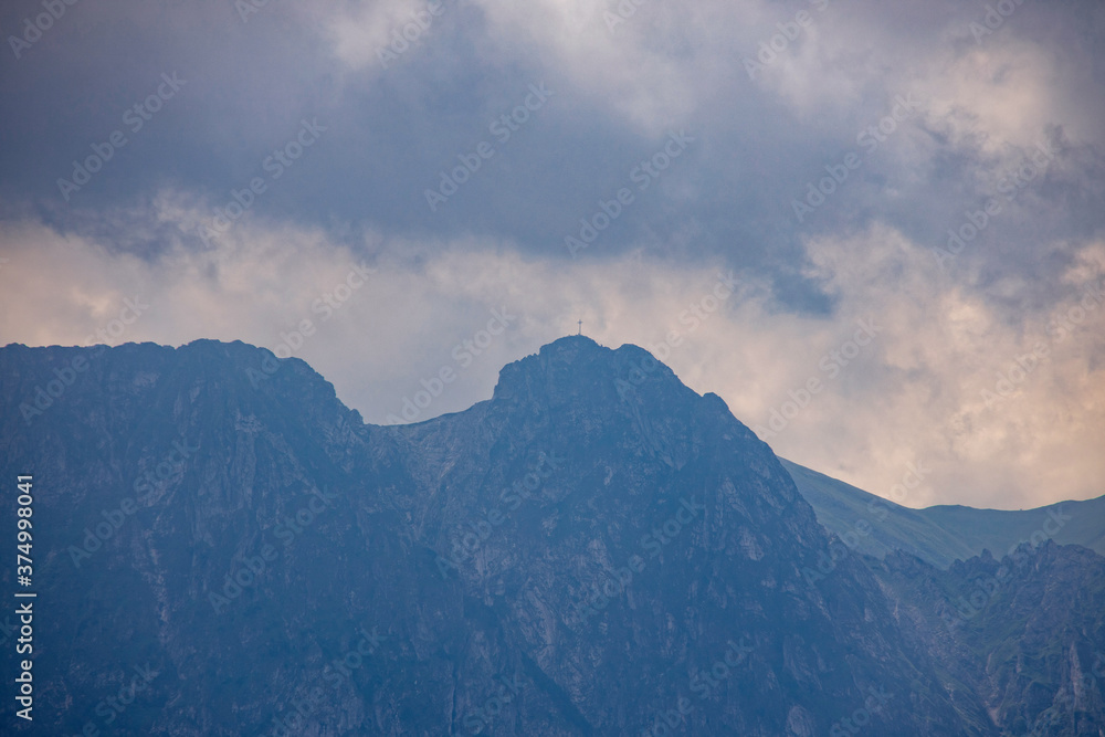 landscape of the Tatra Mountains and Giewont Gubałówka on a warm summer cloudy holiday day