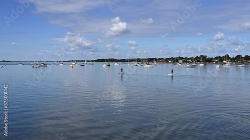 Stand Up Paddle Boards with Yachts and Boats on the water at Emsworth