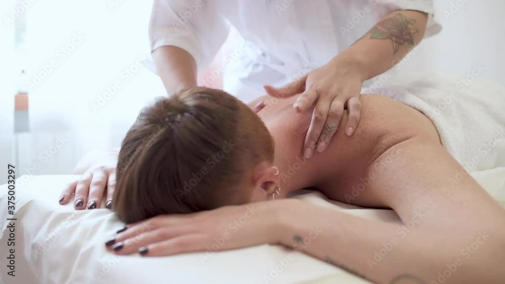Woman receiving massage Woman receiving massage