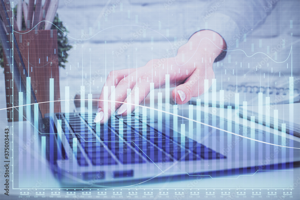 Multi exposure of woman hands typing on computer and forex chart hologram drawing. Stock market analysis concept. Multi exposure of woman hands typing on computer and forex chart hologram drawing. Stock market analysis concept.
