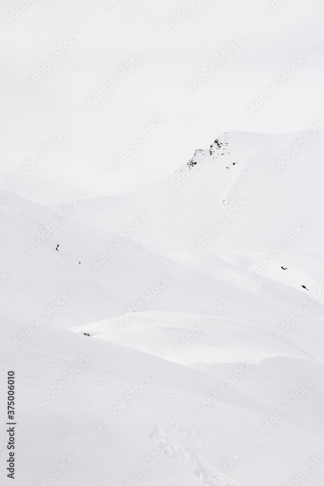 White shapes in the mountains White shapes in the mountains