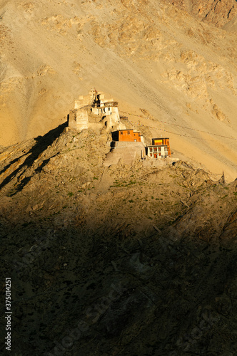 Sunset on the ruined Fort of Tashi Namgyal and the Gonkhang and Maitreya Temple, Leh, Ladakh, Jammu and Kashmir State, India. photo