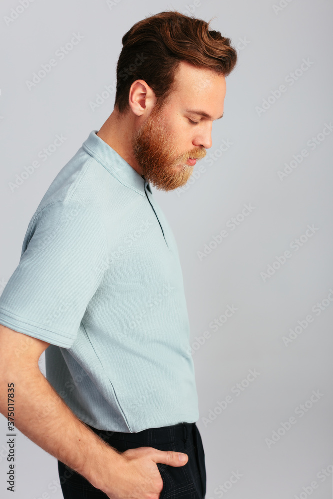 Side view of a bearded man in studio Side view of a bearded man in studio