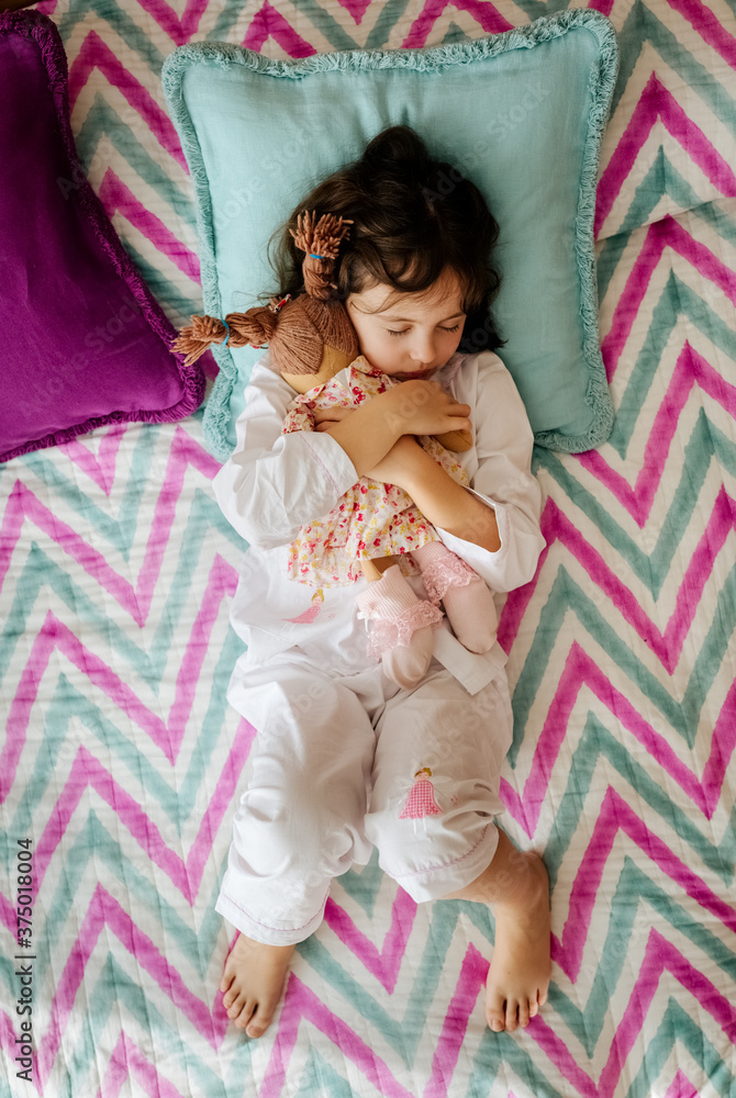Little girl sleeping in the bedroom Little girl sleeping in the bedroom