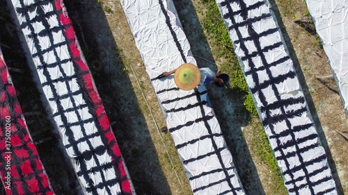 Sukoharjo Indonesia August 10 2020 : pattren fabric hanging in the field, making batik process photo