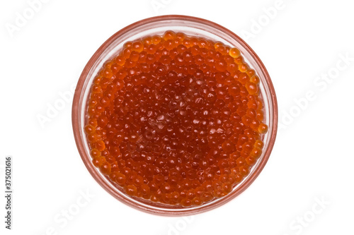 Red caviar in a glass dish isolated on a white background