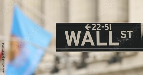 Wall Street road sign in downtown lower Manhattan, USA