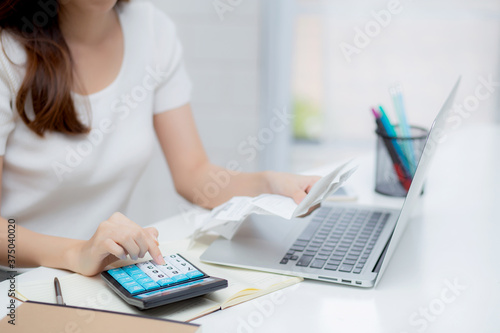 Young asian woman calculating expenses household about finance and frustrated on desk at home, girl checking bill having stress and worried, debt and tax, expression and emotion, business concept.