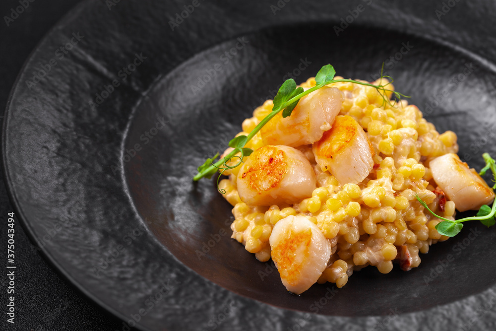 Ptitim, birdy pasta, couscous with fried scallops, herbs Ptitim, birdy pasta, couscous with fried scallops, herbs