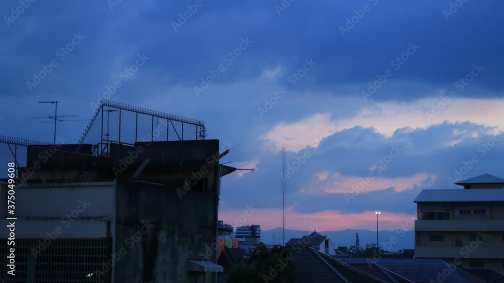 Cityscape aerial view of Old & new city buildings or business office constructions on Purple pink evening twilight sunset clouds sky background, Cinemagraphs B-roll TimeLapse of Day to Night Scene Cityscape aerial view of Old & new city buildings or business office constructions on Purple pink evening twilight sunset clouds sky background, Cinemagraphs B-roll TimeLapse of Day to Night Scene